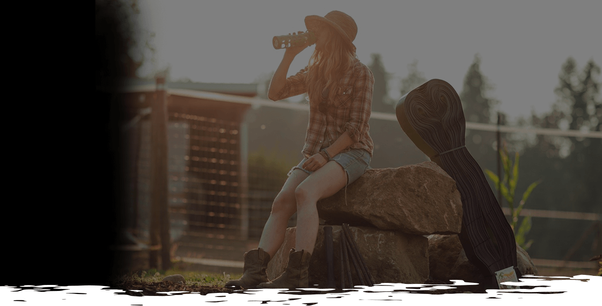 Person Sitting on a Rock